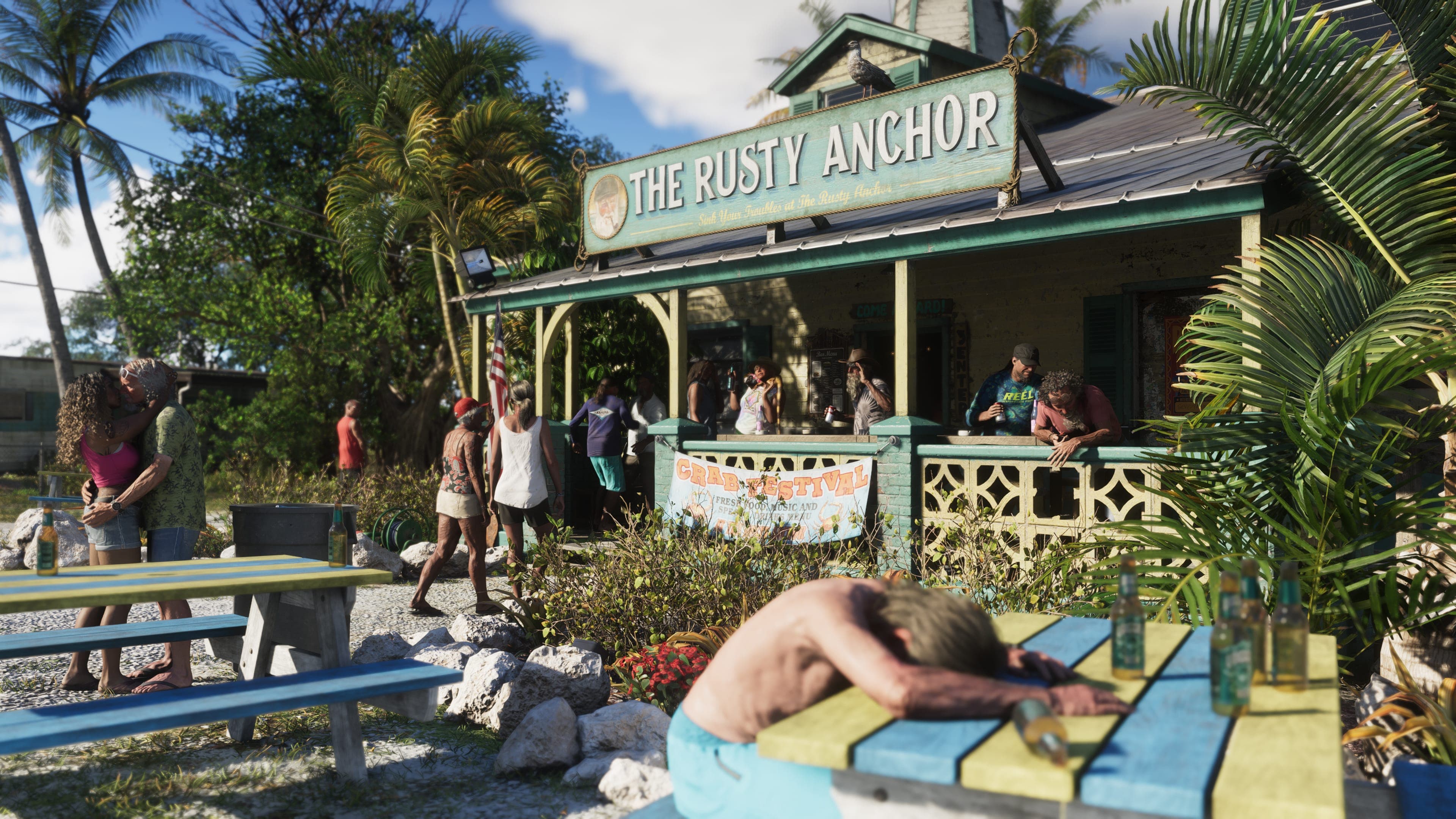 The Rusty Anchor, a wooden waterfront bar in the Keys with picnic benches and palms
