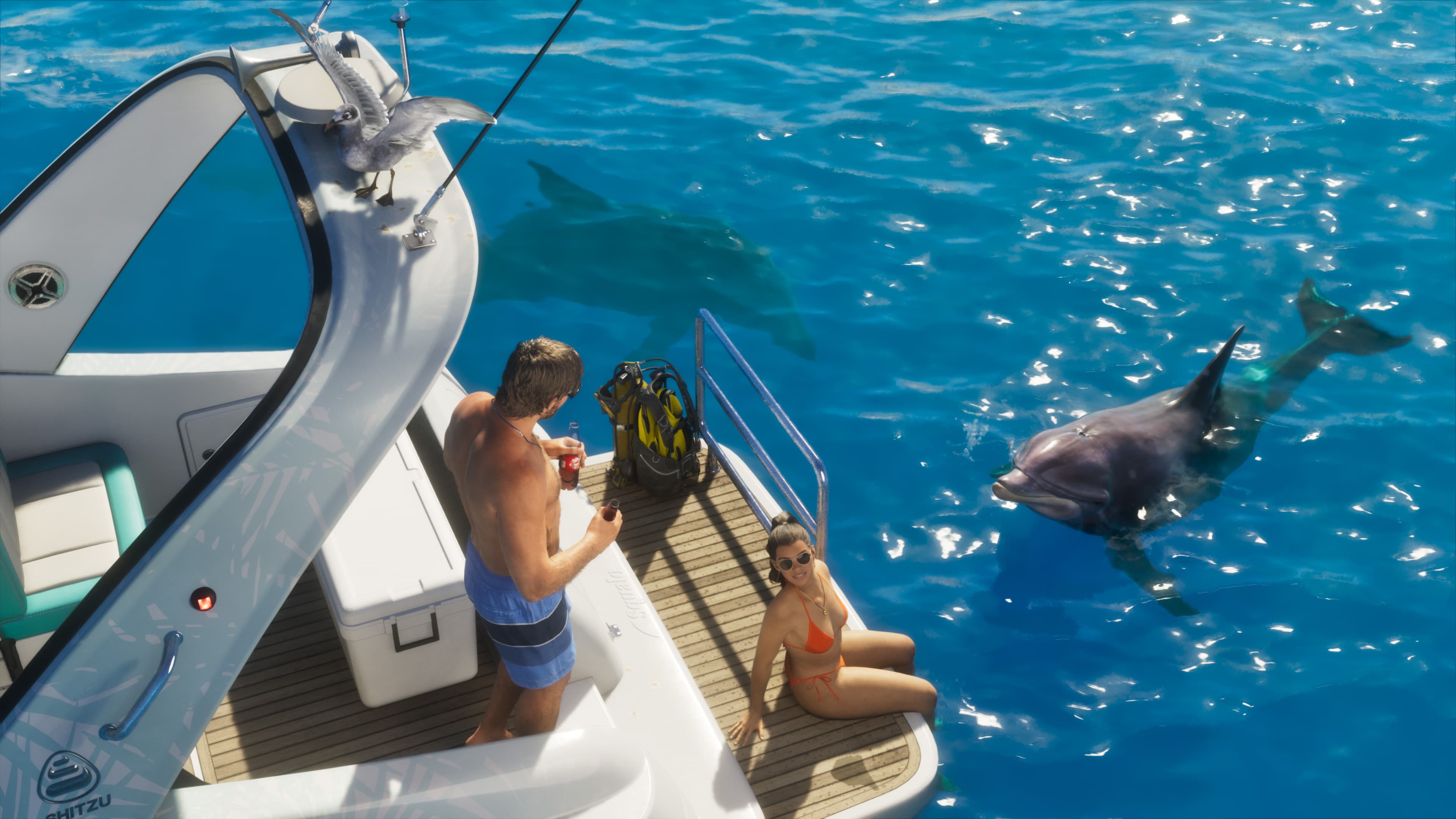 People sitting on the back of a moored speedboat watching a dolphin surface alongside