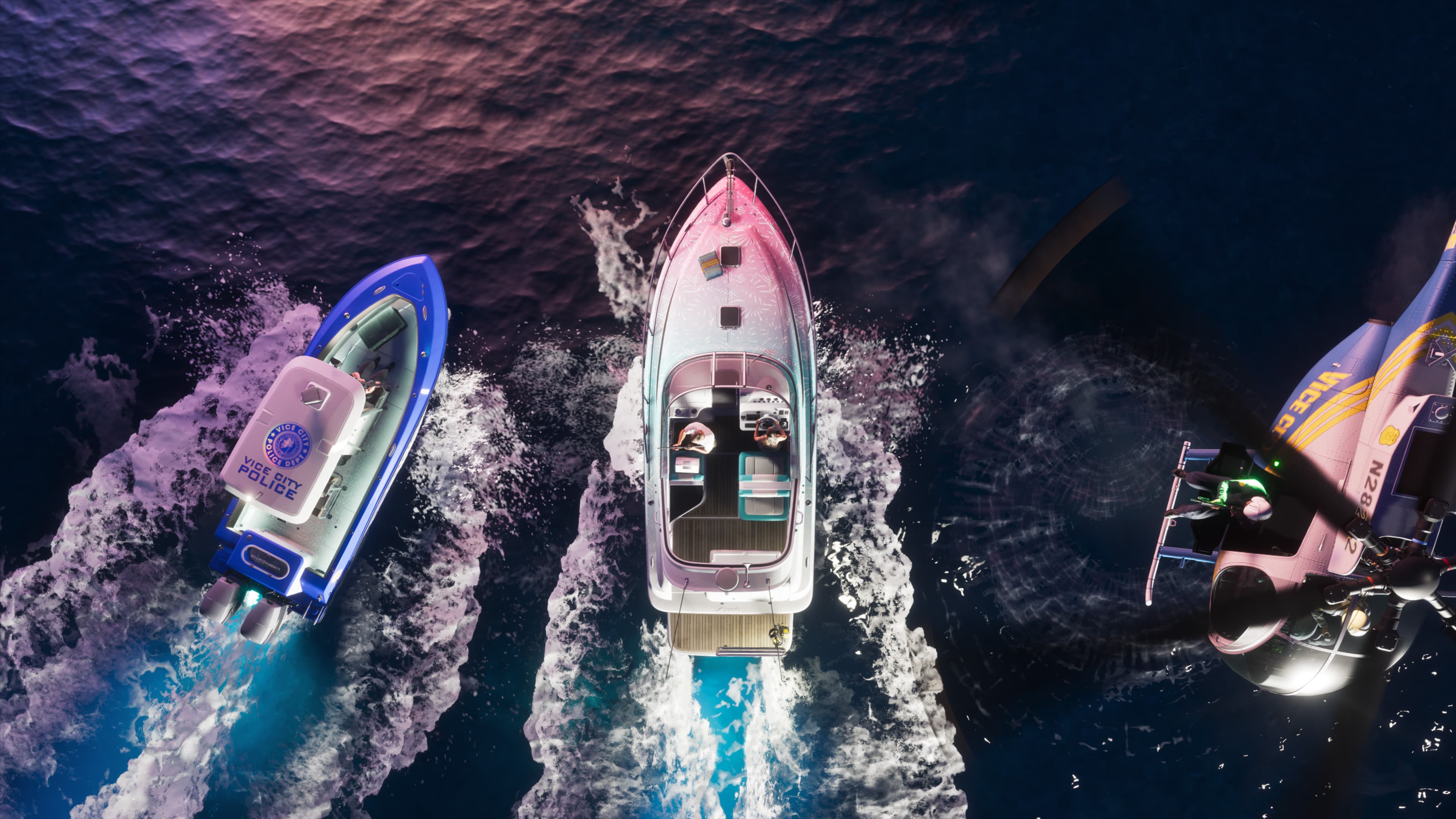 Overhead view of two speedboats and a jet ski running side by side across open water