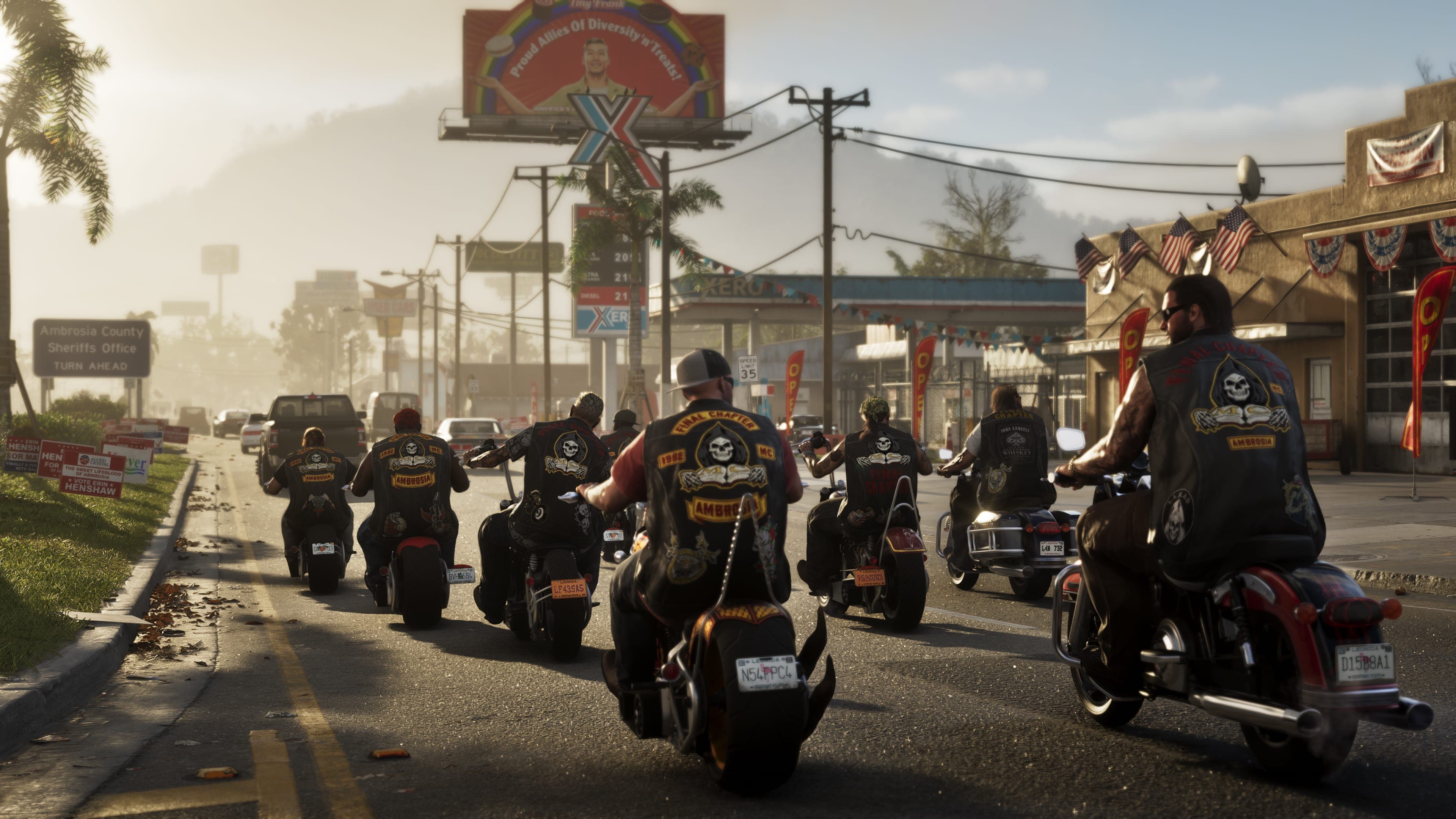 A biker club riding in formation down a two-lane road past roadside signage