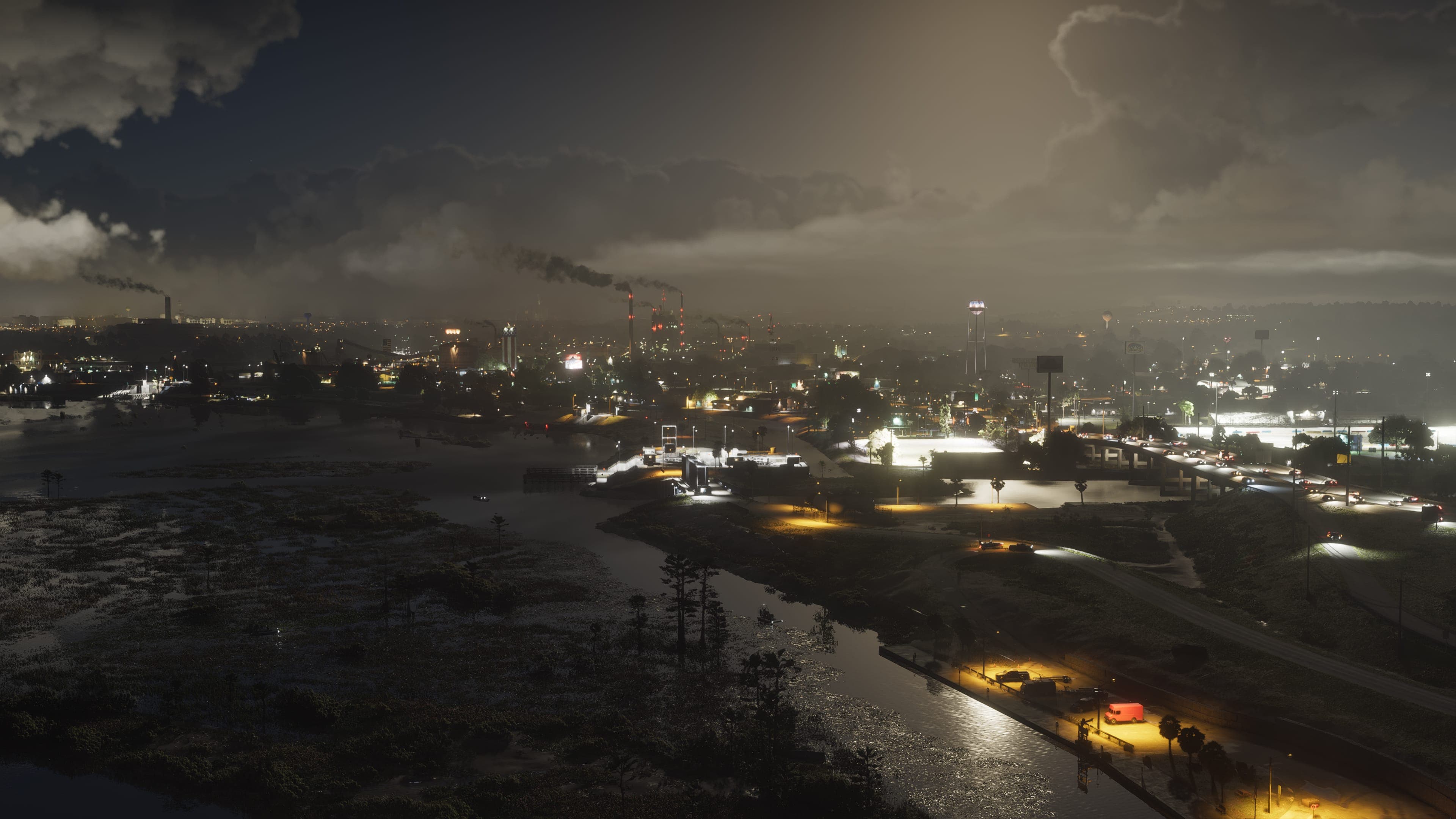 A dark rural vista looking down on the scattered lights of a small town