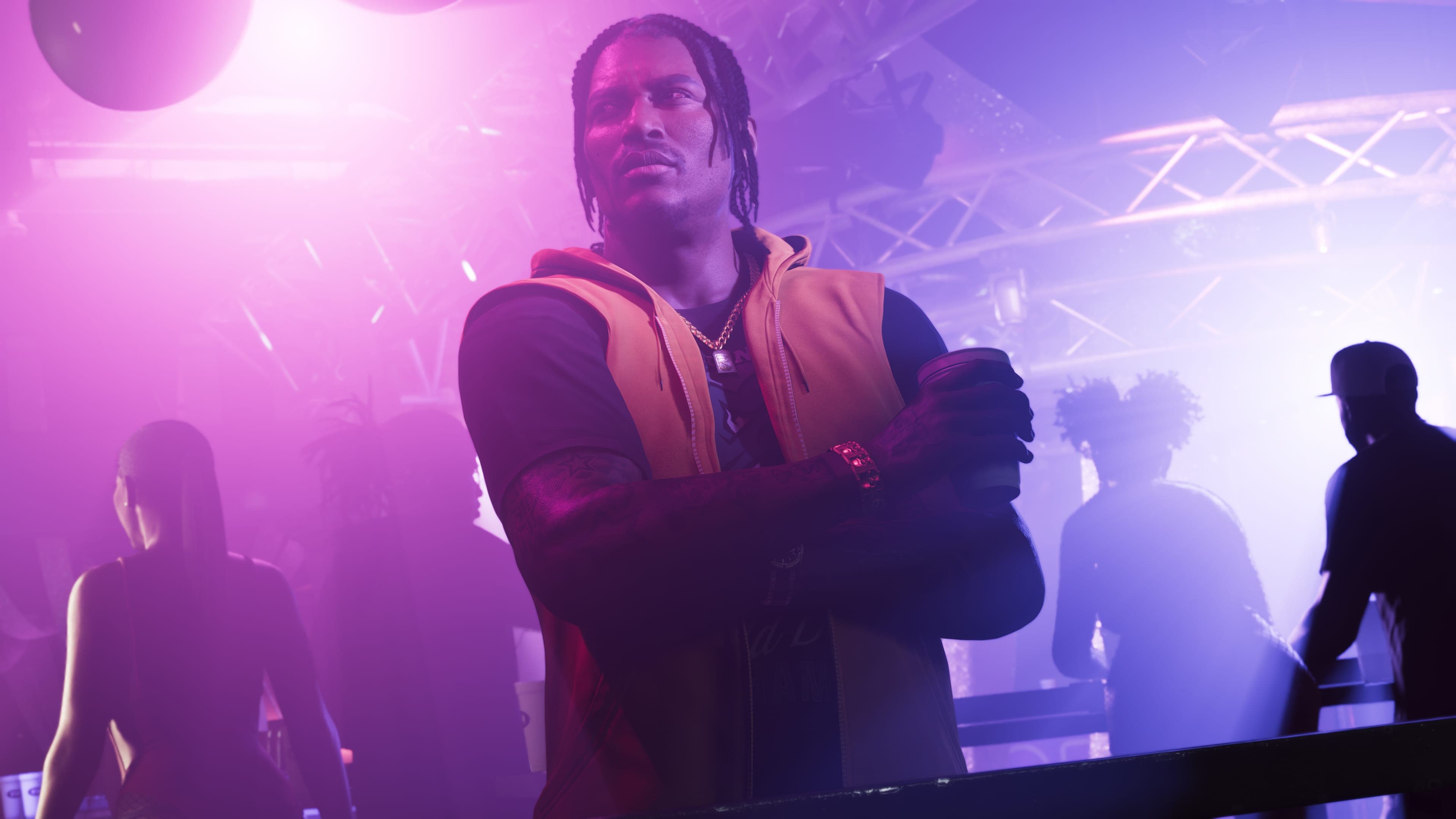 Dre'Quan Priest on a smoke-filled stage under purple lights