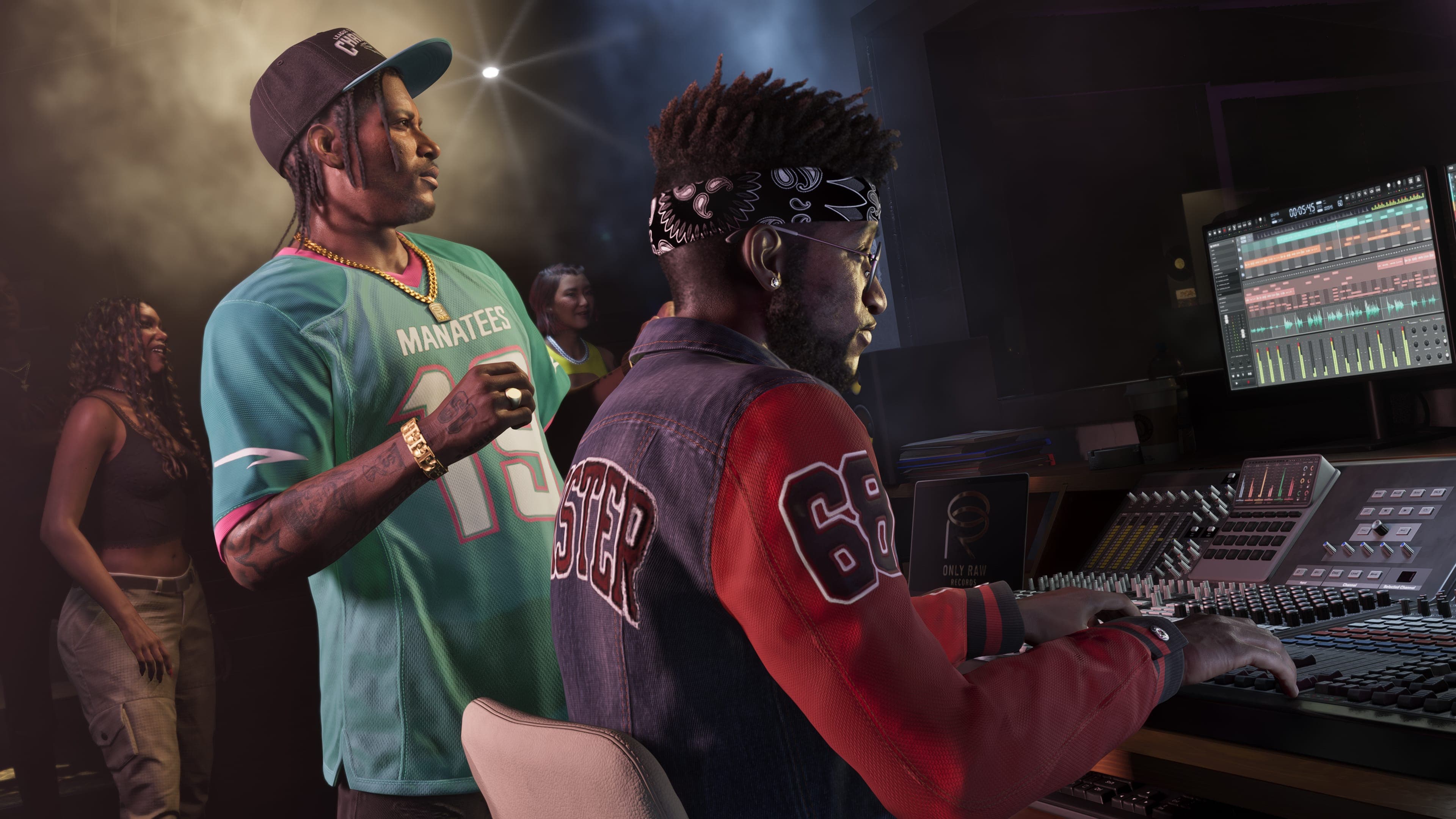 Dre'Quan Priest and an artist at a recording studio mixing desk