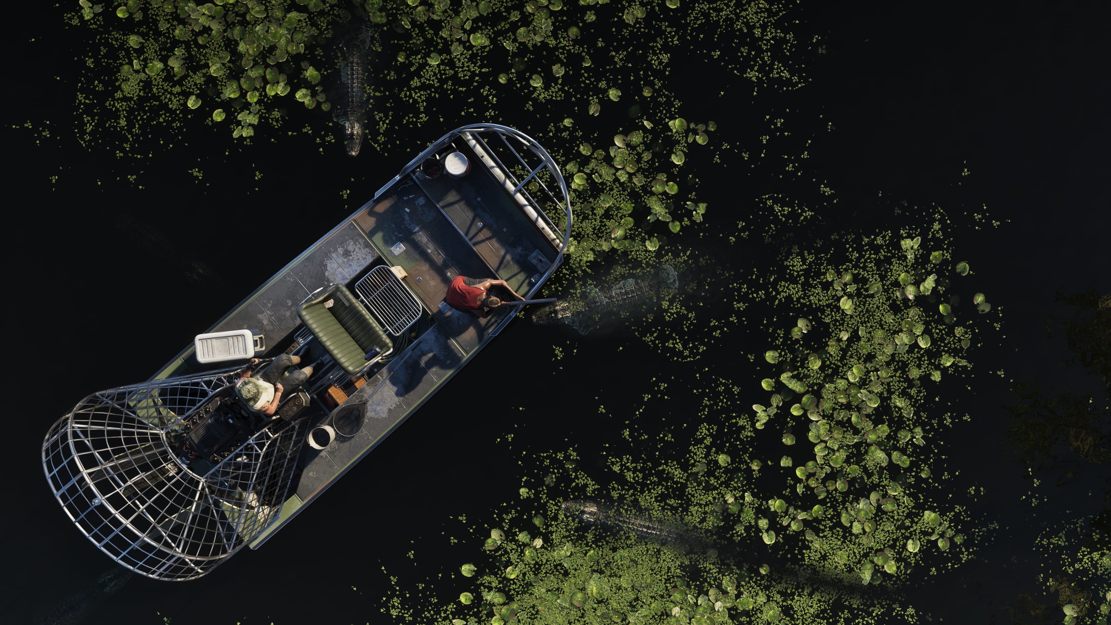 Overhead view of a lone airboat crossing dark water between mats of weed