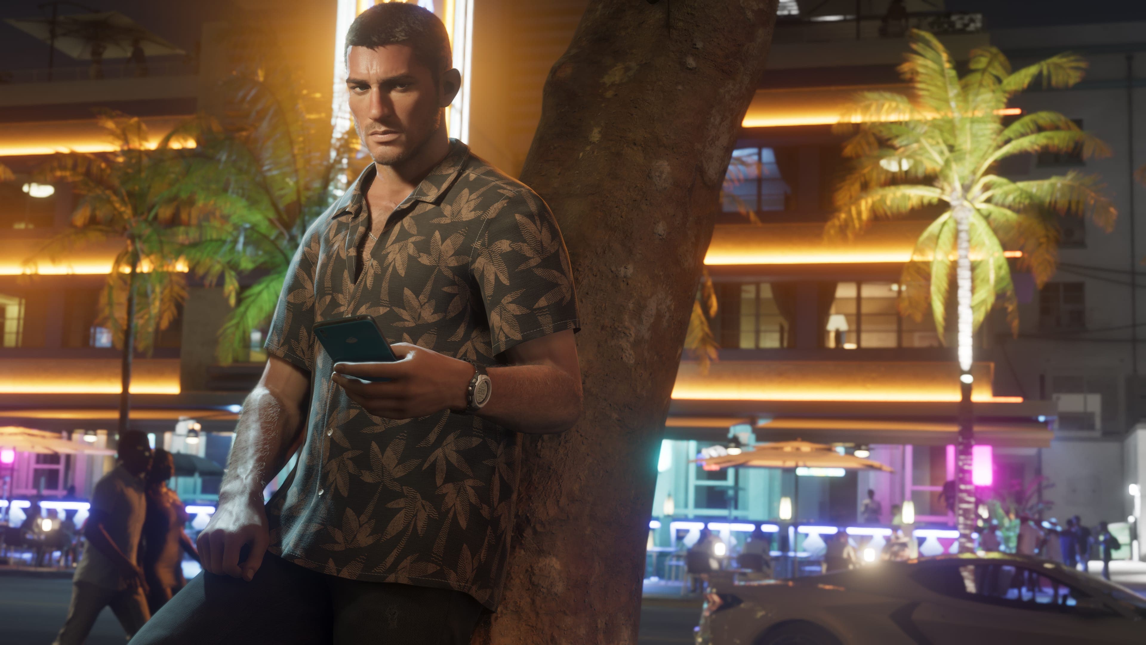 Jason Duval on a neon-lit Vice City street at night, phone in hand