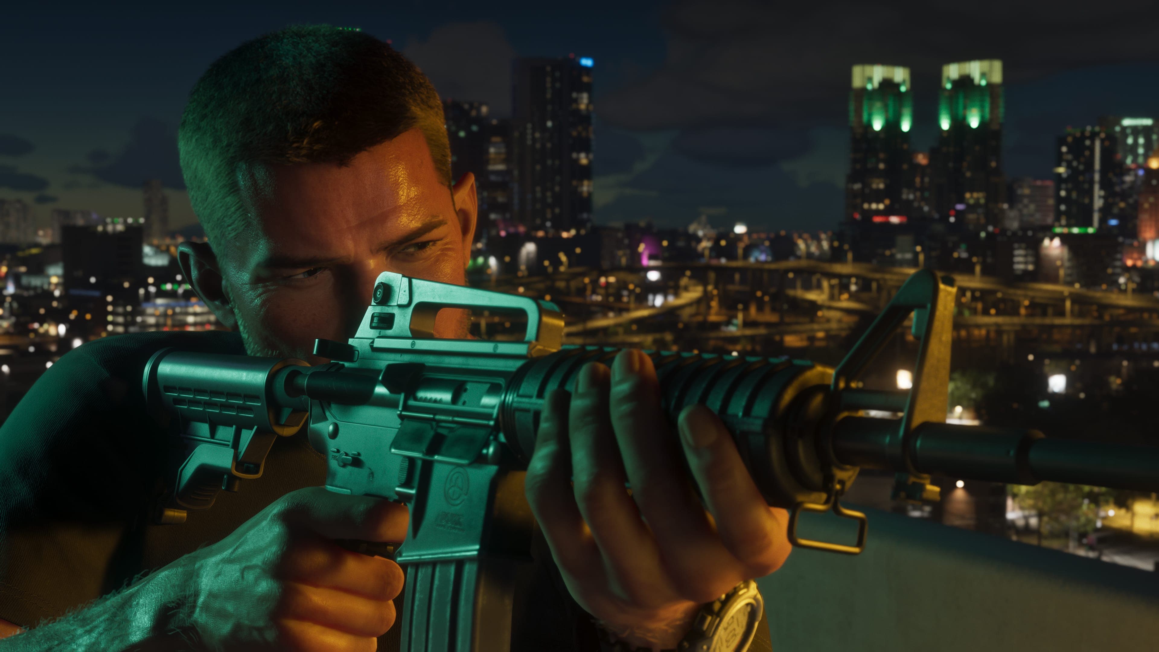 Jason Duval shouldering an assault rifle at night with the lit downtown skyline behind him