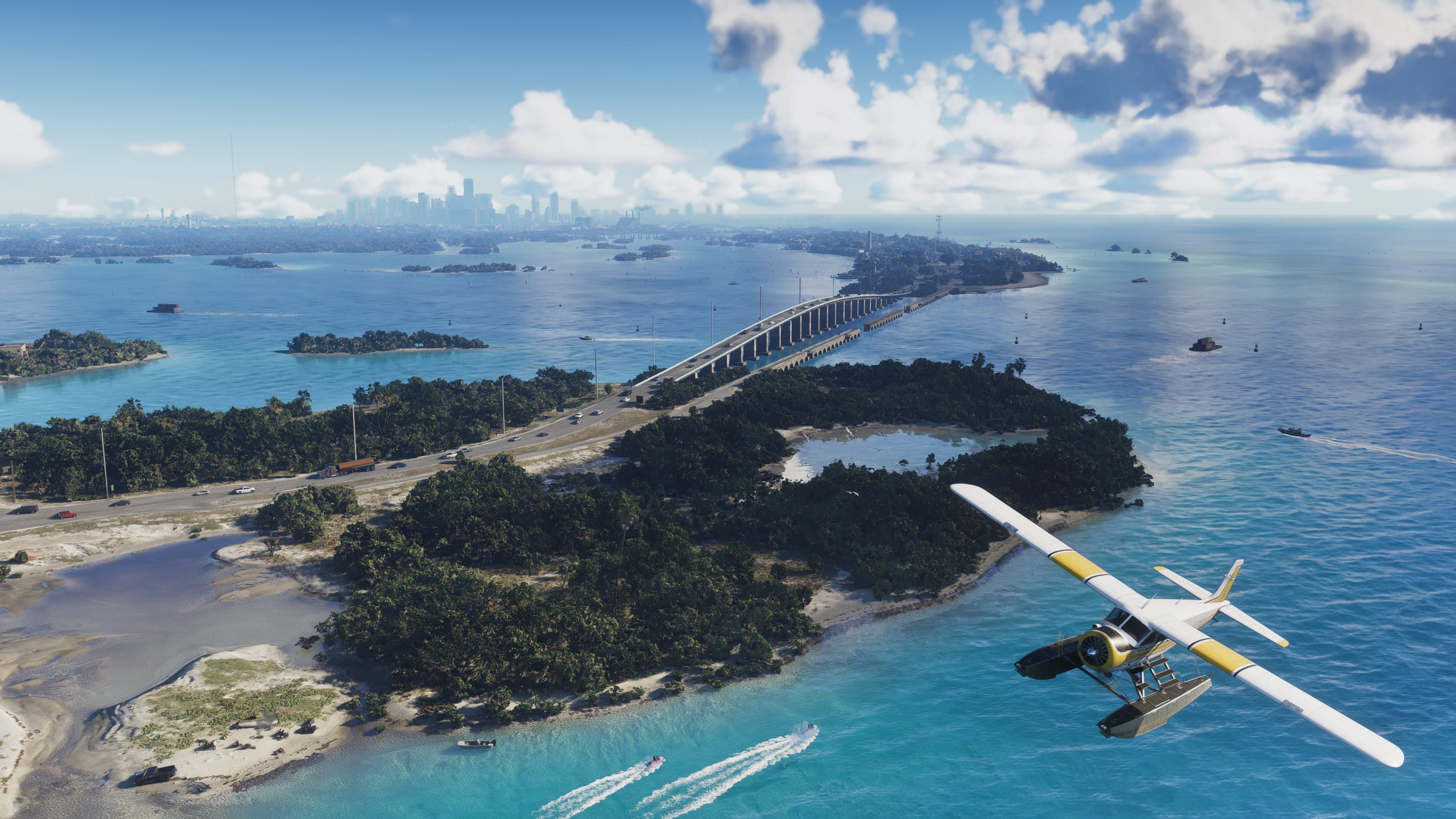 A seaplane flying low over the Leonida Keys, a causeway threading between turquoise shallows and small islands