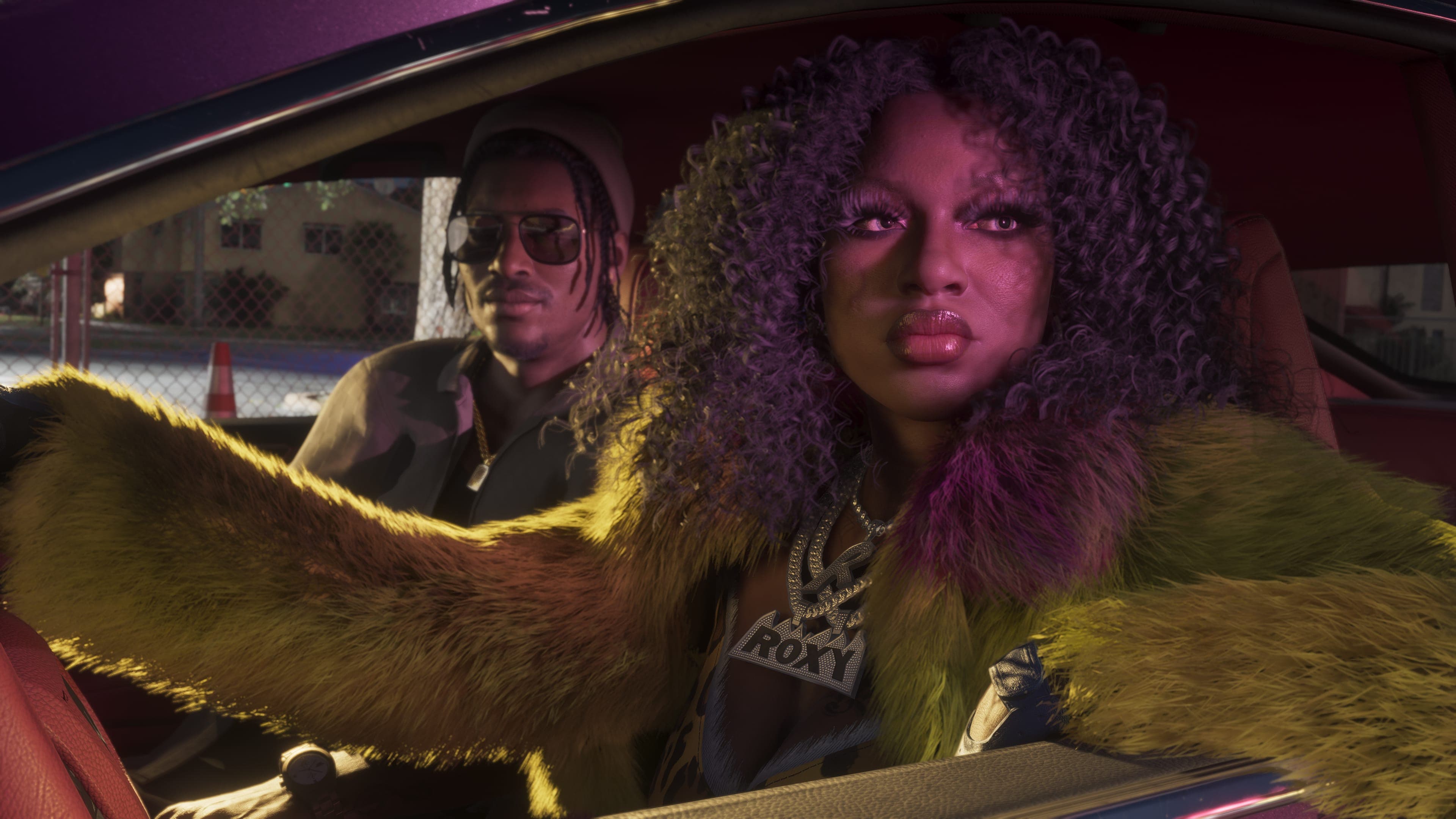 Real Dimez riding in a car, one in a fur coat leaning out the window