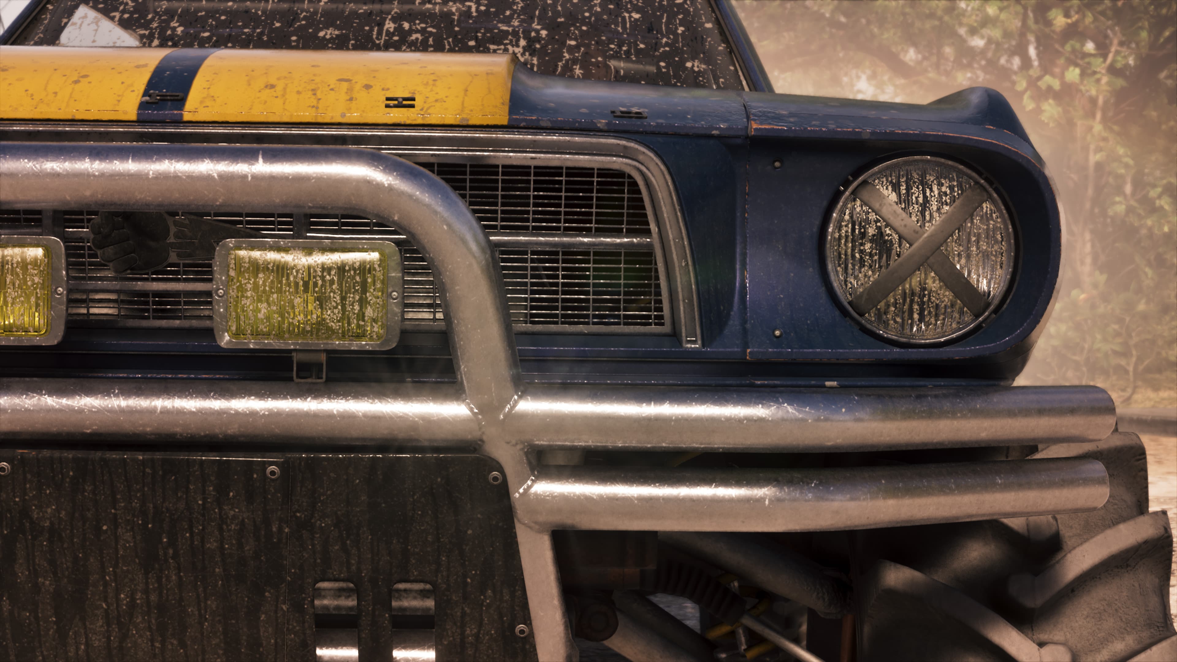 Close detail of the buggy's reinforced front bumper and spotlight