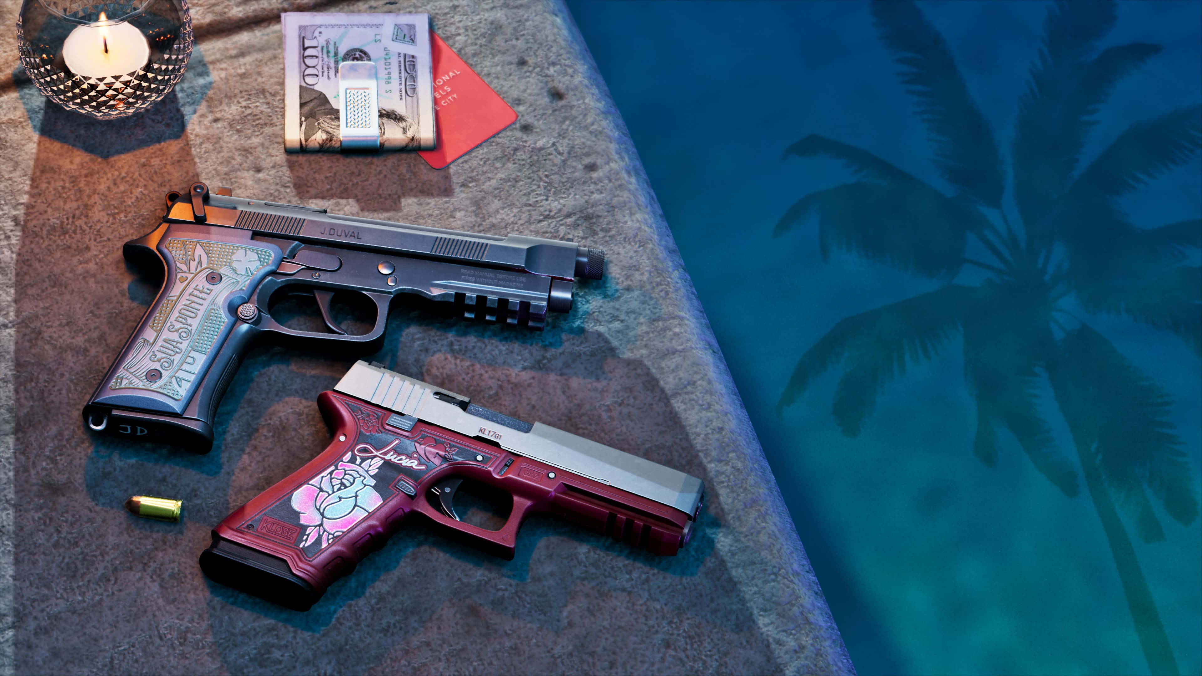 Two decorated semi-automatic pistols arranged on a table beside a card and a candle
