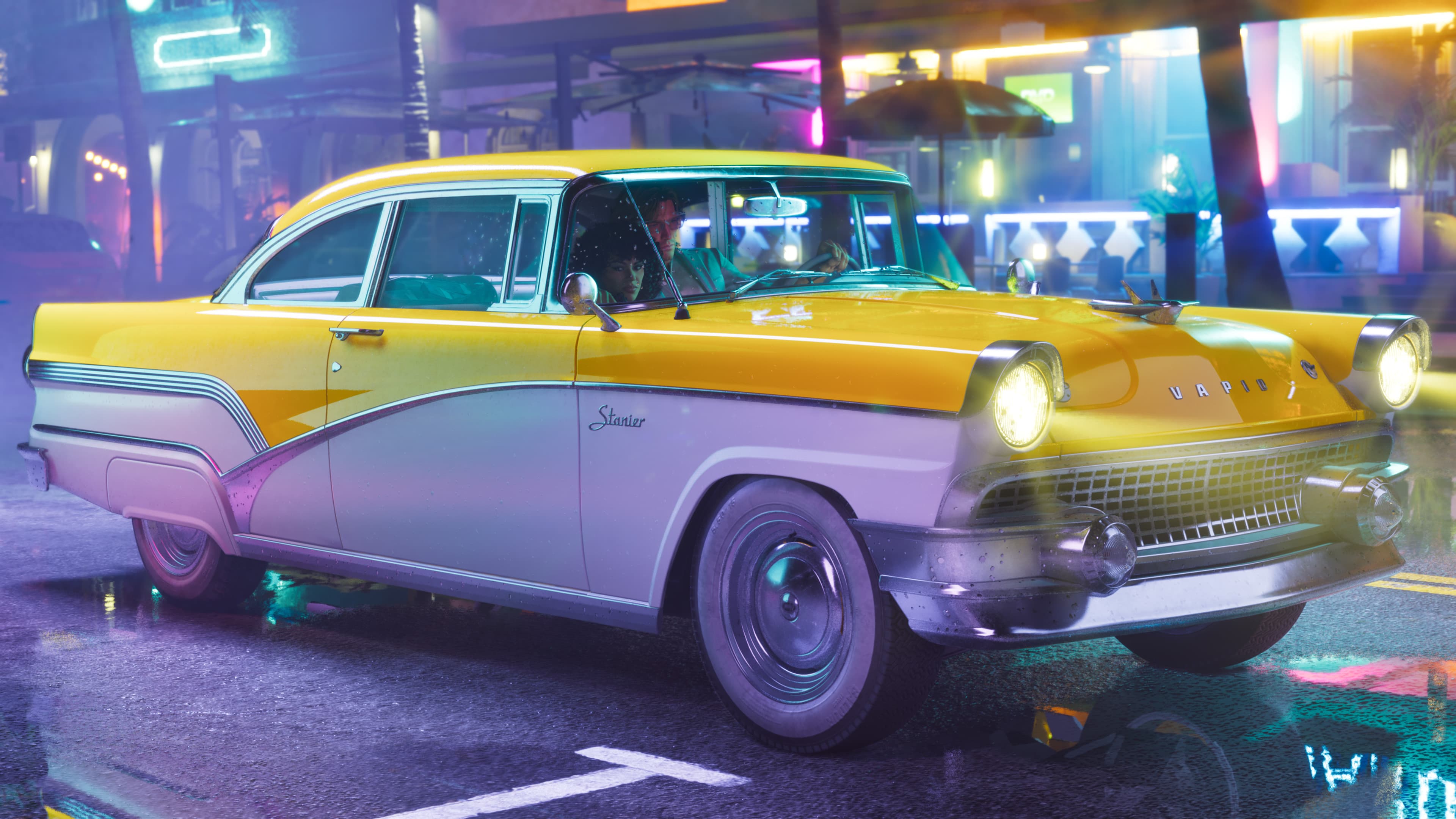 A cream and yellow fifties sedan parked on a neon-lit street at night