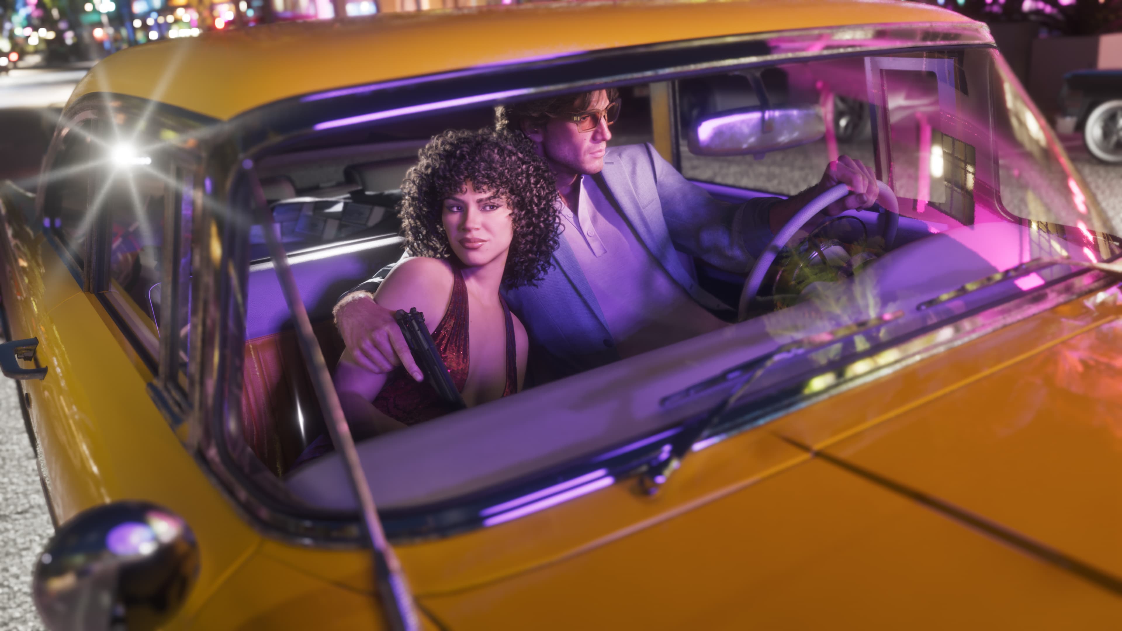 A couple sitting inside the fifties Stanier sedan, lit by street neon