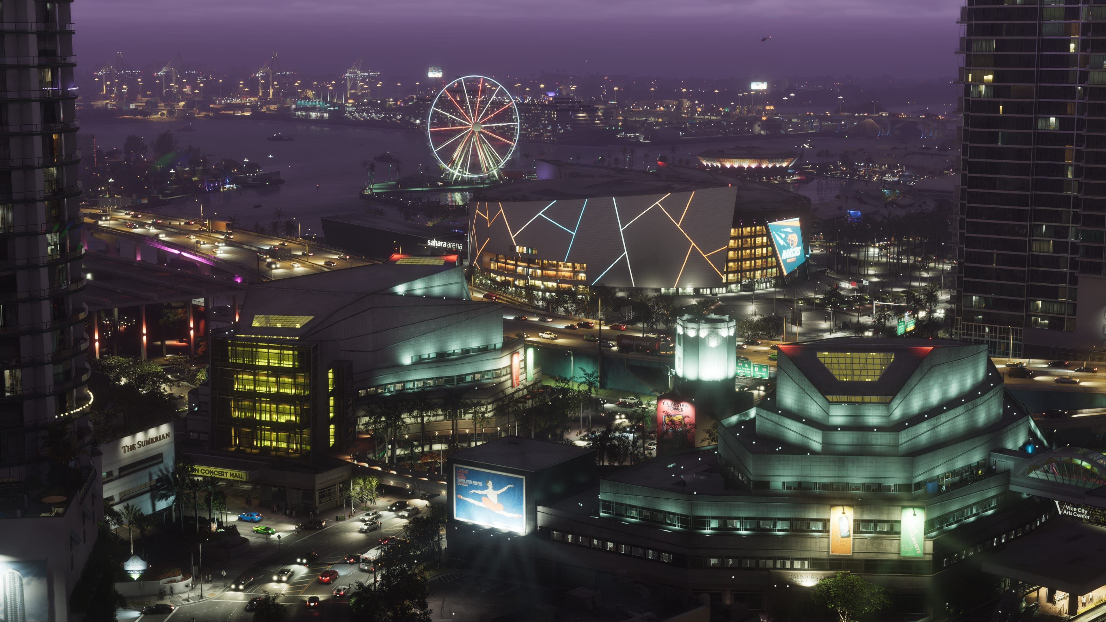Night aerial of the Vice City skyline, with a lit ferris wheel and the arena district in the foreground
