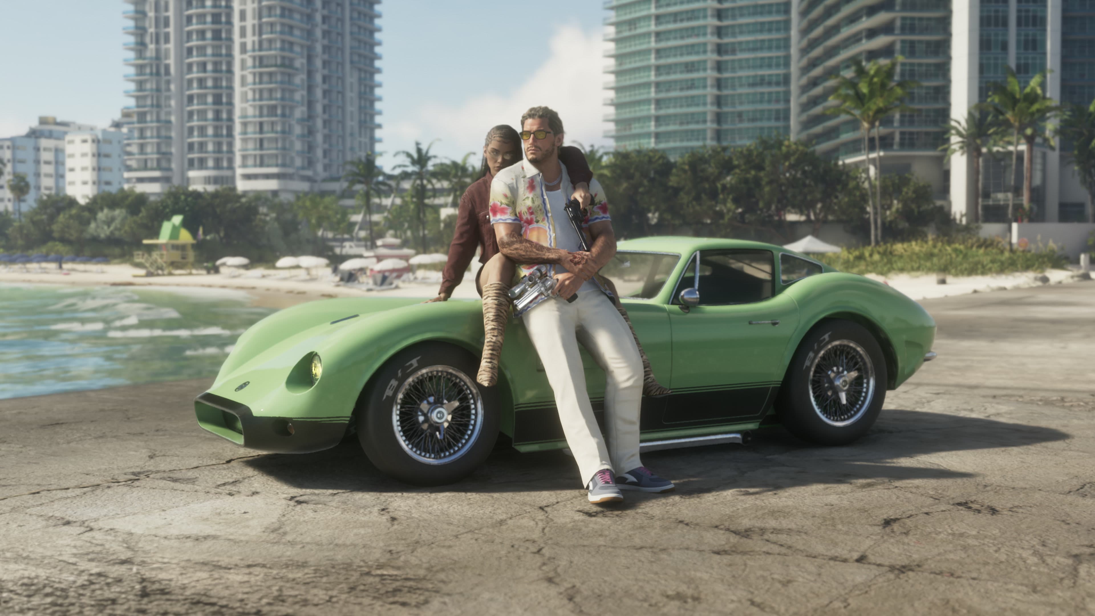 Jason and Lucia leaning on a green Grotti sports car parked on the sand with the ocean behind them